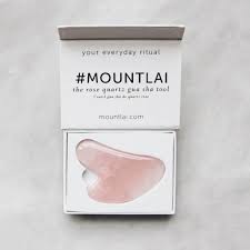 The rose quartz gua sha tool